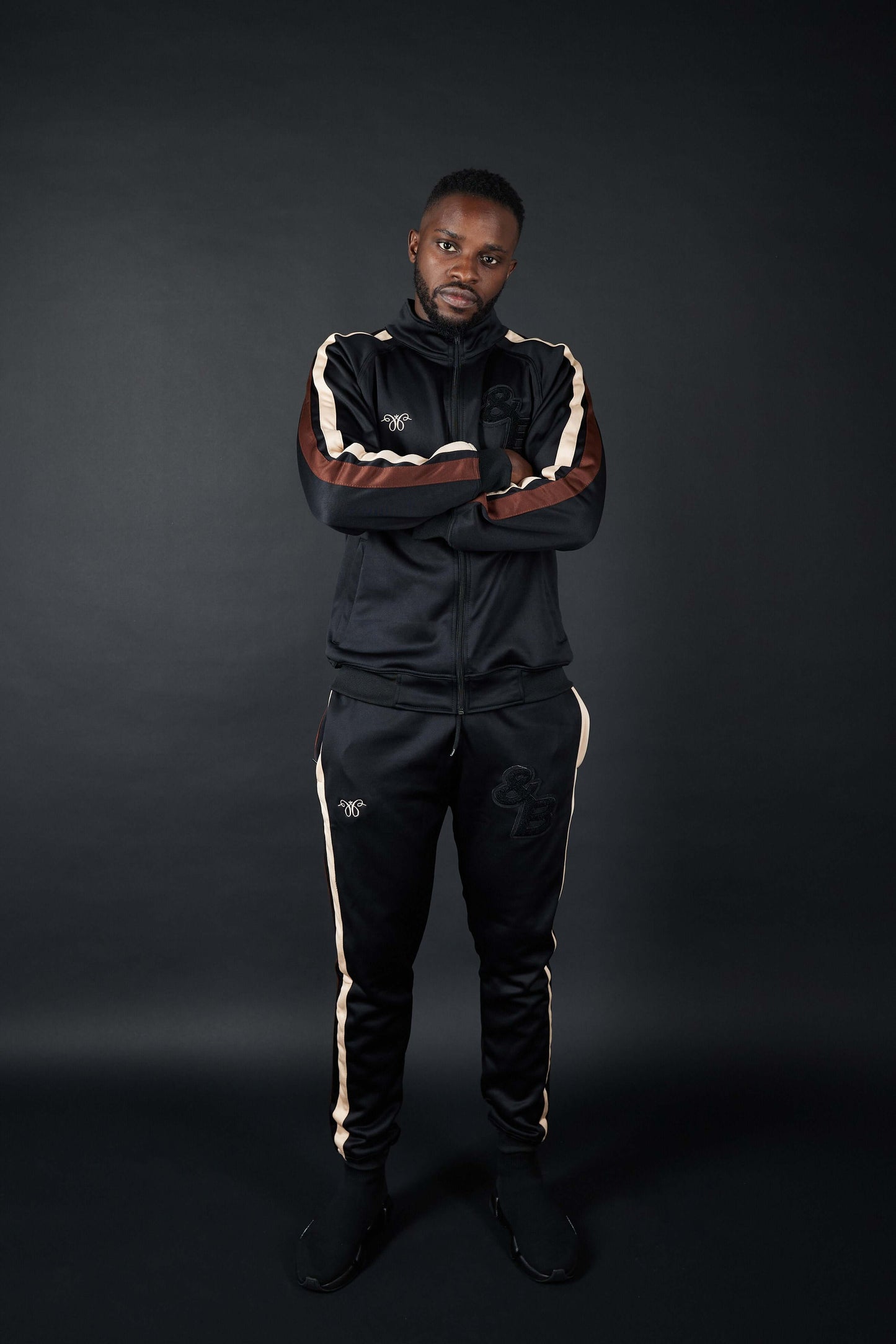 Elevate Your Style with Twin Stripe Badge Joggers in Black, Beige, and Mocha