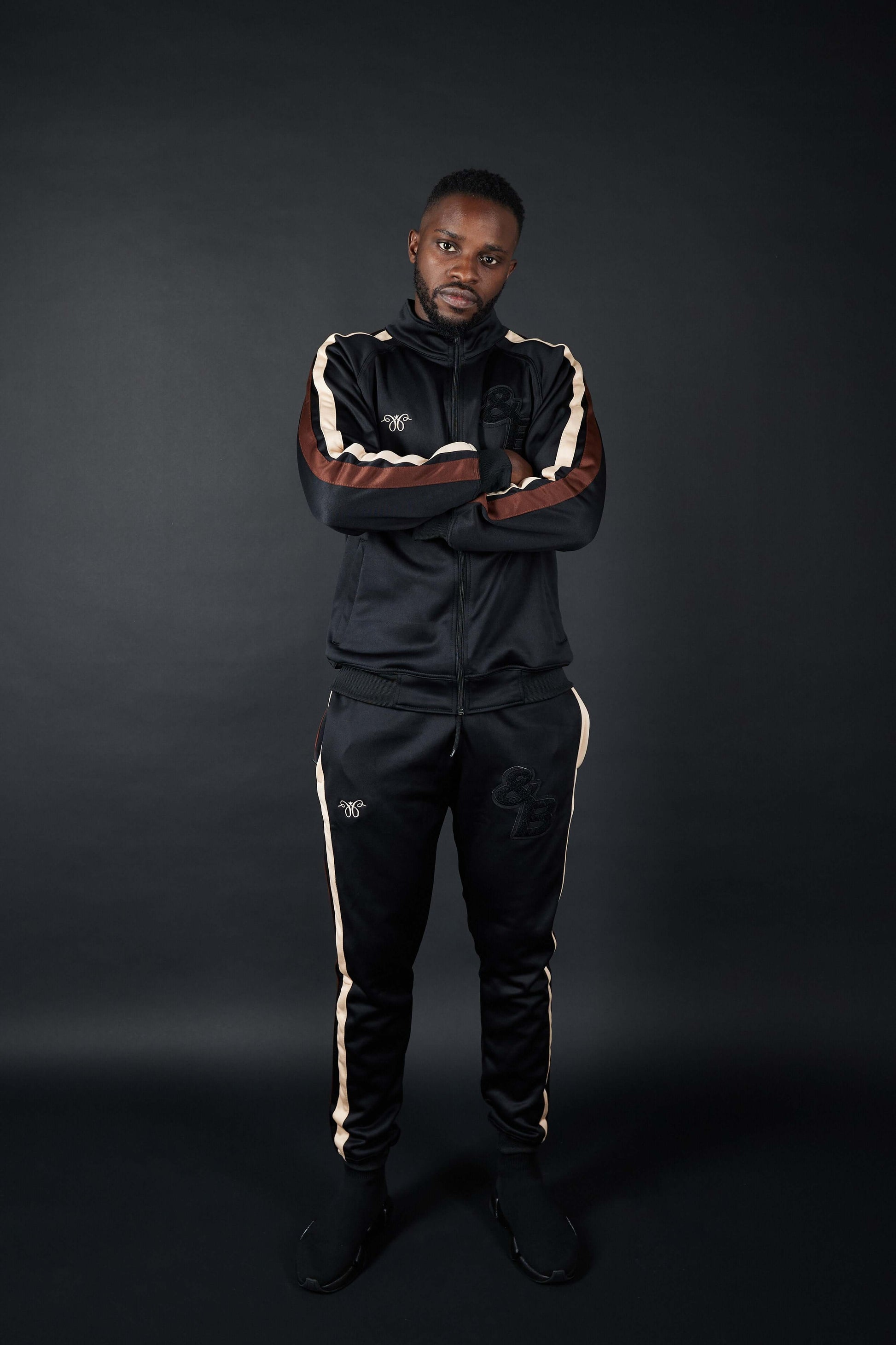 Elevate Your Style with Twin Stripe Badge Joggers in Black, Beige, and Mocha