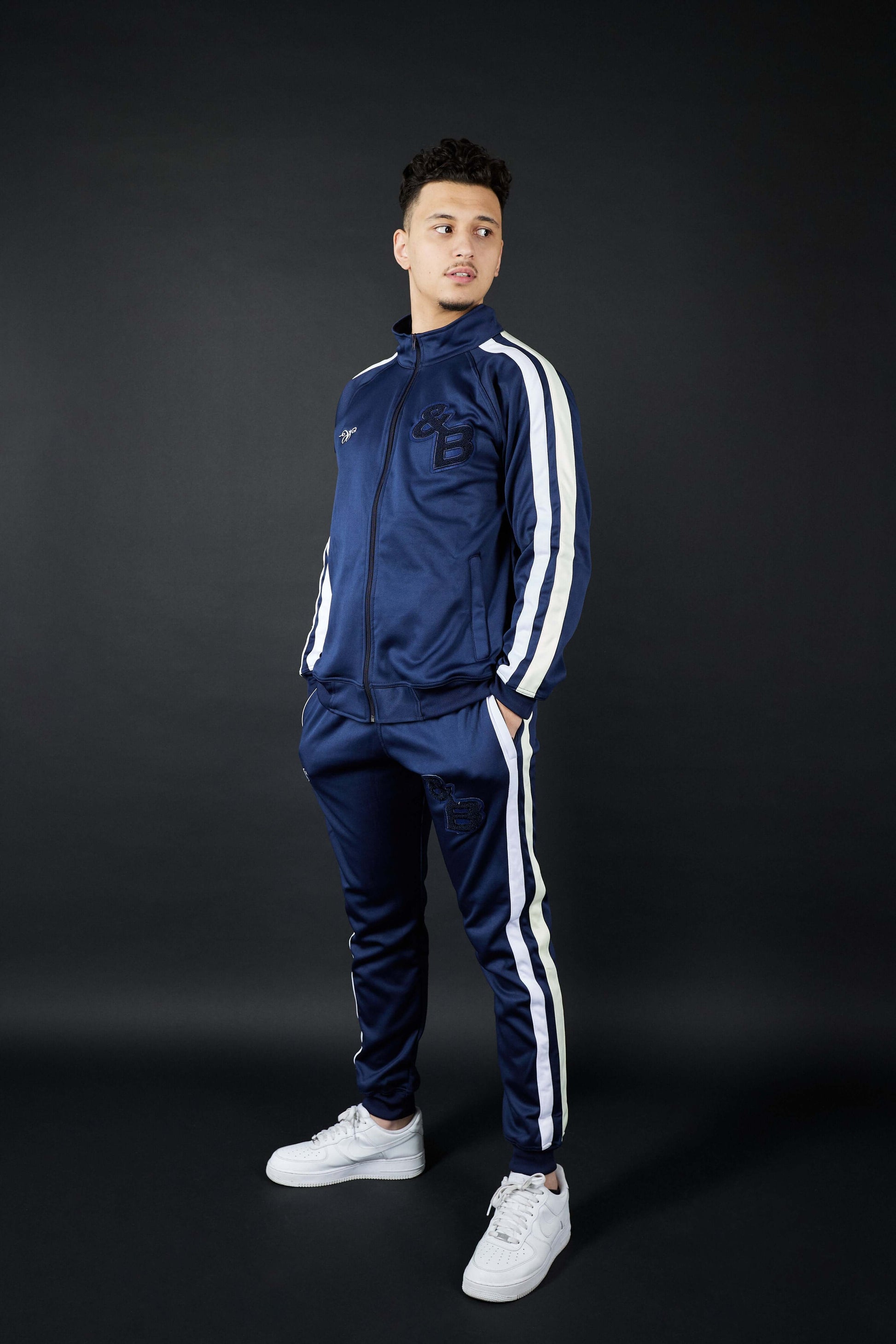 Elevate Your Comfort with Twin Stripe Badge Joggers in Navy, White, and Cream