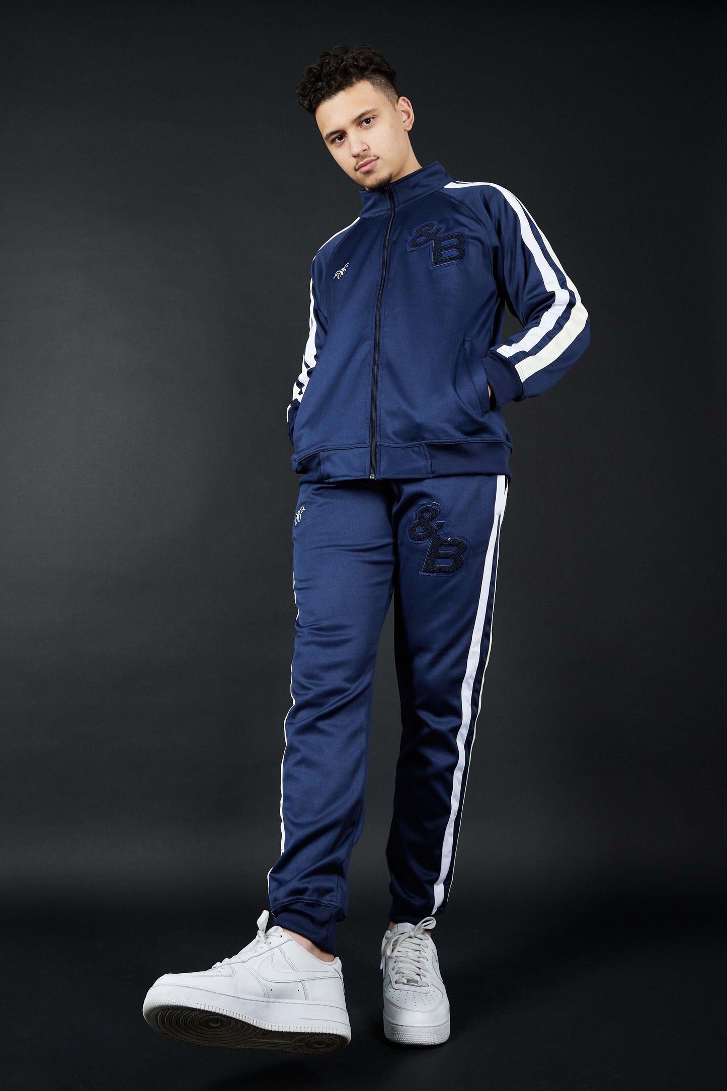 Elevate Your Comfort with Twin Stripe Badge Joggers in Navy, White, and Cream